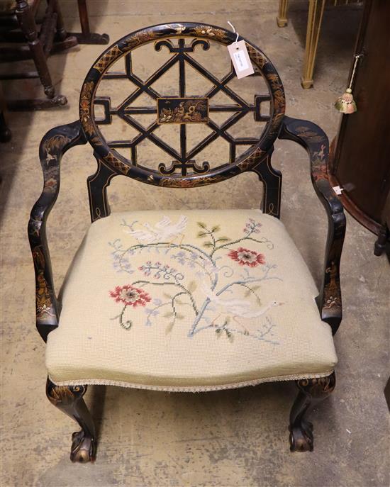 A painted and chinoiserie lacquered open armchair with pierced circular back and needlework seat, Width 59cm